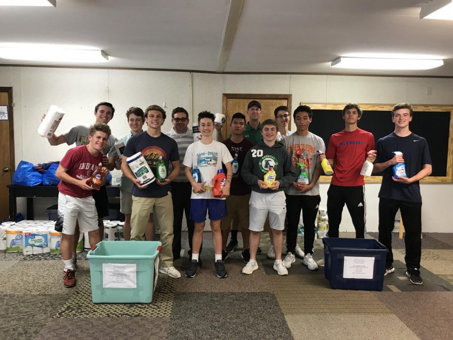 Roswell Boys Soccer team helping organize supplies for the families.
Credit: Sylvia Nelson