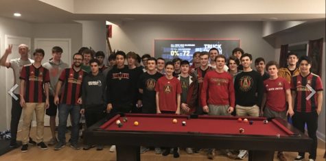 the boys are having a fun pasta dinner while watching Atlanta United! 