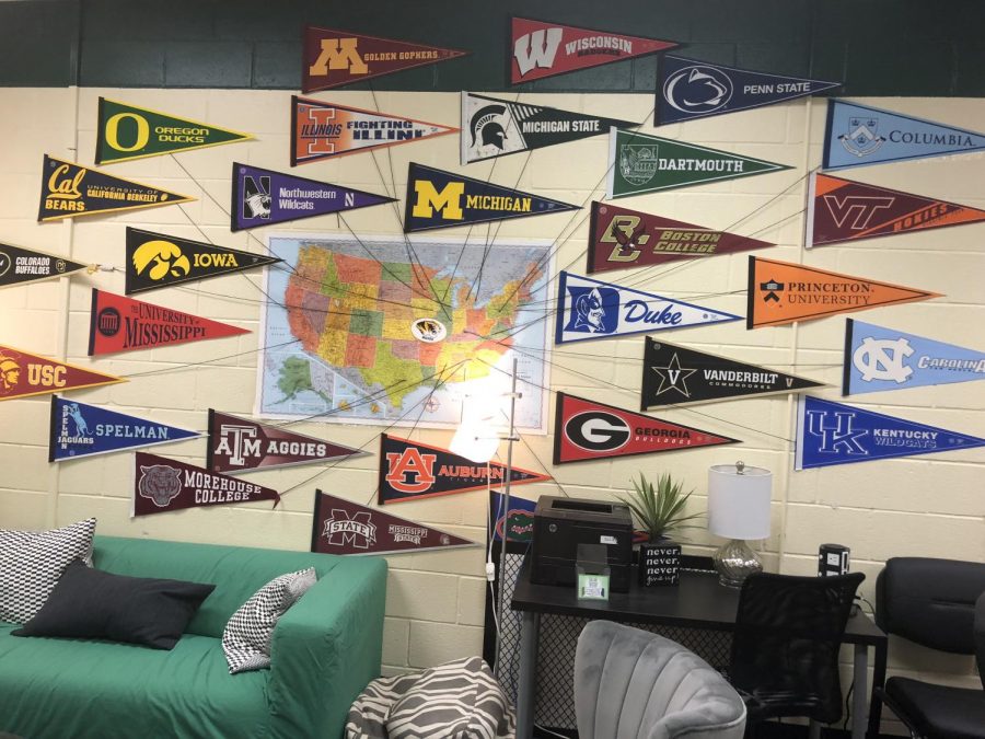 The+wall+of+the+HUB+is+covered+in+college+banners+of+the+multiple+schools+around+the+country.+These+banners+serve+as+motivators+for+students+getting+ready+to+move+on+to+college.+Credit%3A+Smriti+Tayal