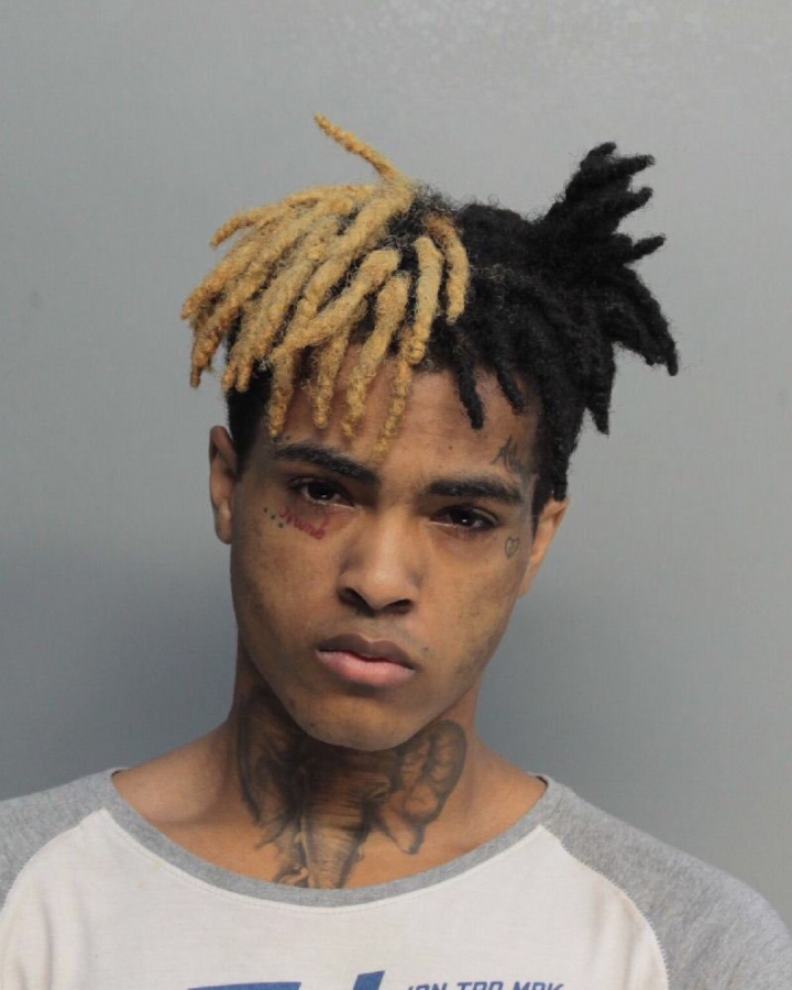 This is the mugshot of XXXTentacion, a famous rapper charged in a series of terrible crimes through his career and yet acclaimed by the people. Credit: Florida Department of Corrections