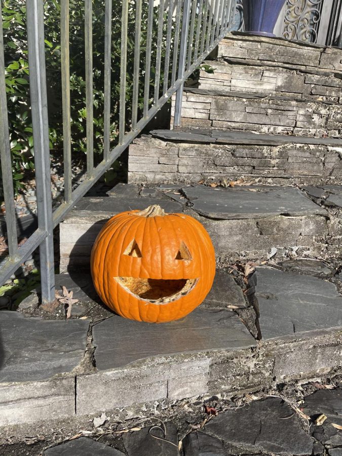 This smiling pumpkin is just one of many cute and scary designs you can carve with friends and family. Photo Credit: Gemma Muellerhill