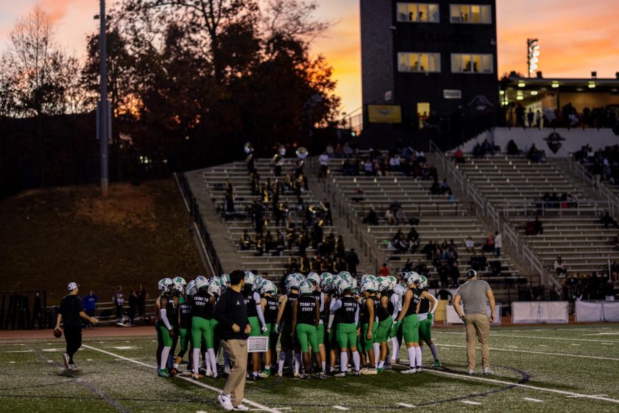 The team gathers before their big game to get ready and hype each other up with a beautiful sky to set the scene. (Credit: Trent Slaughter)