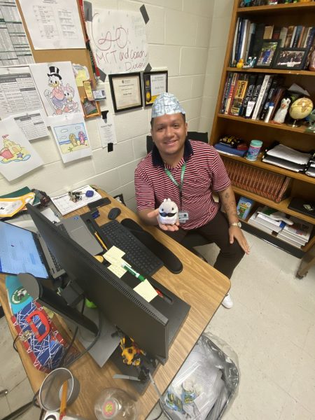 Mr. T decorates his room with memorabilia from his students to create a more fun and supporting environment. Walking in to see posters from athletic events, art projects made by his students, and his Lego collection always brightens up students days. (Credit: Drew Maddox)
