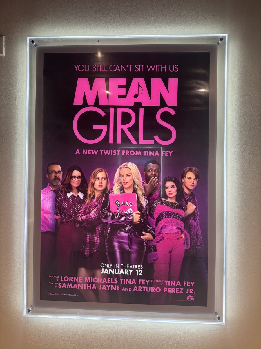 The new Mean Girls movie poster at Roswell Aurora Cineplex, featuring Renee Rapp and a music tremble symbol highlighting Tina Fey’s musical twist on the iconic Mean Girls movie. (Credit: Abby Fisher) 