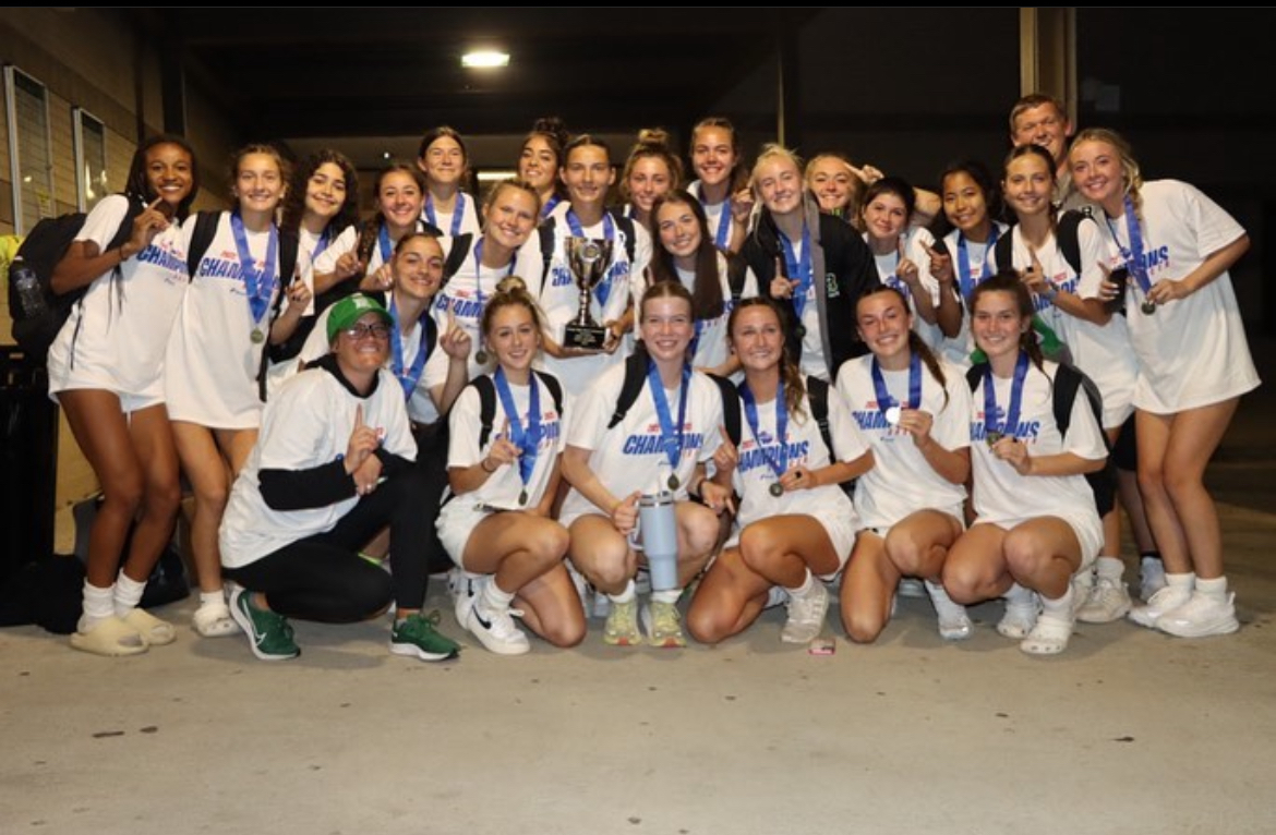 The varsity girls 2023 team smiles with their state championship medals concluding their 15-4-2 season. (Credit: @roswellsoccer on Instagram)