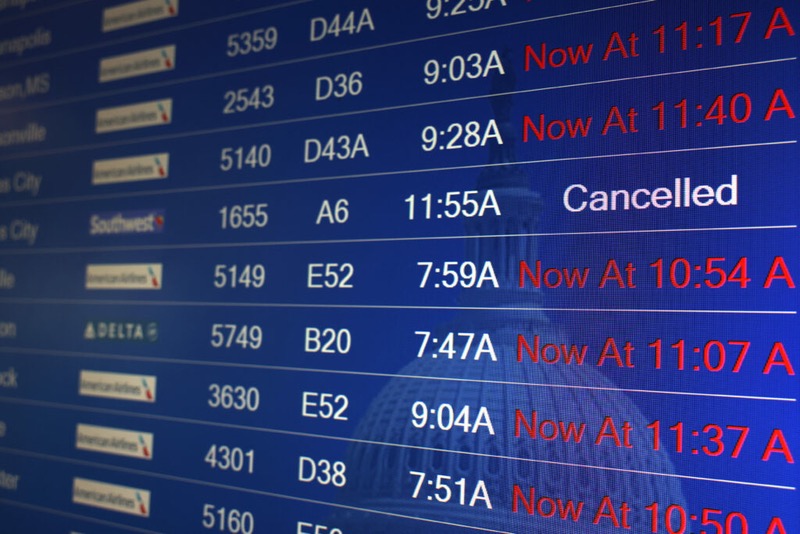 Many flights displayed as cancelled or delayed due to the outage.