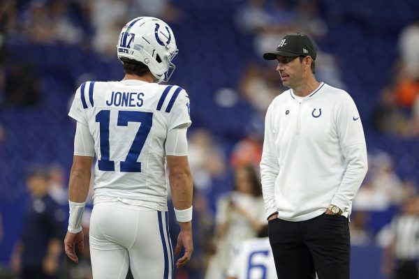 Colts' quarterback Daniel Jones and Head Coach Shane Steichen discussing the game plan before a preseason game. (Getty Images)